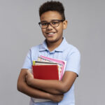 little-boy-with-notebooks